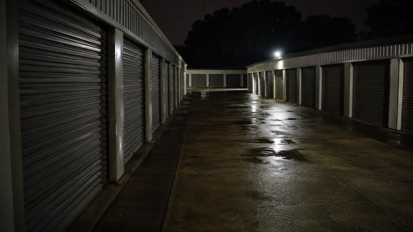 Dim self-storage corridor at night