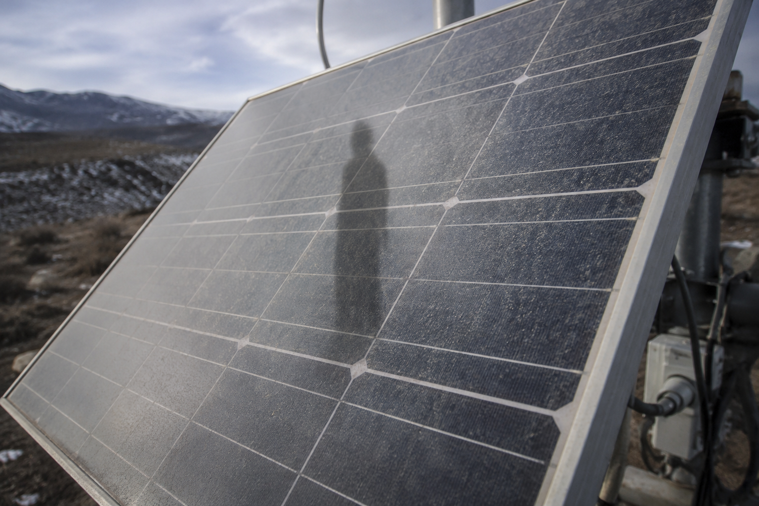 Narrow shape reflected in solar panel