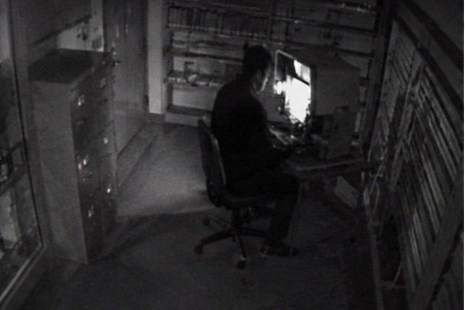 The strangest frame was not a blur in the doorway. It was the shadow sitting still at the reader.