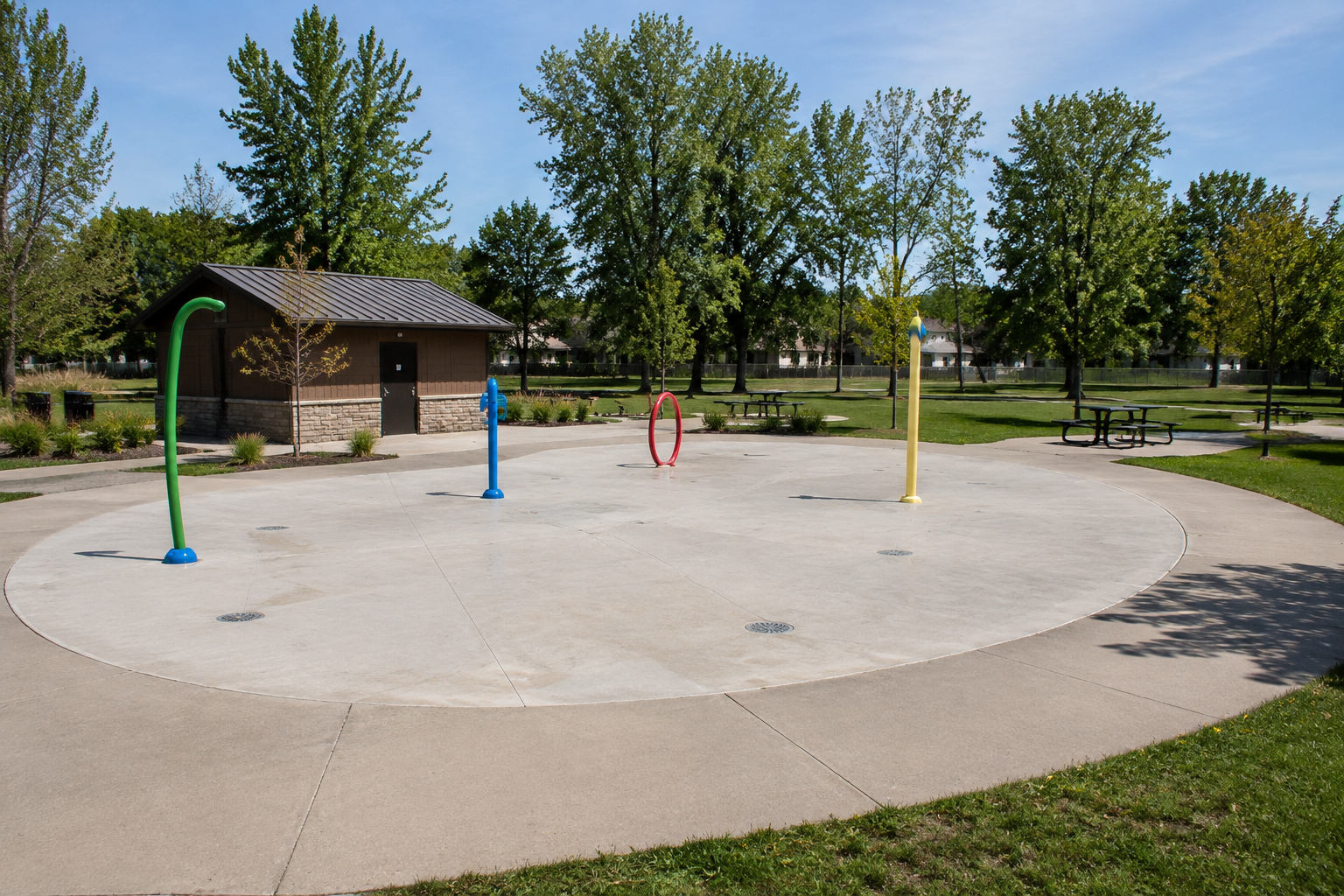 Splash pad and pump shed in daylight