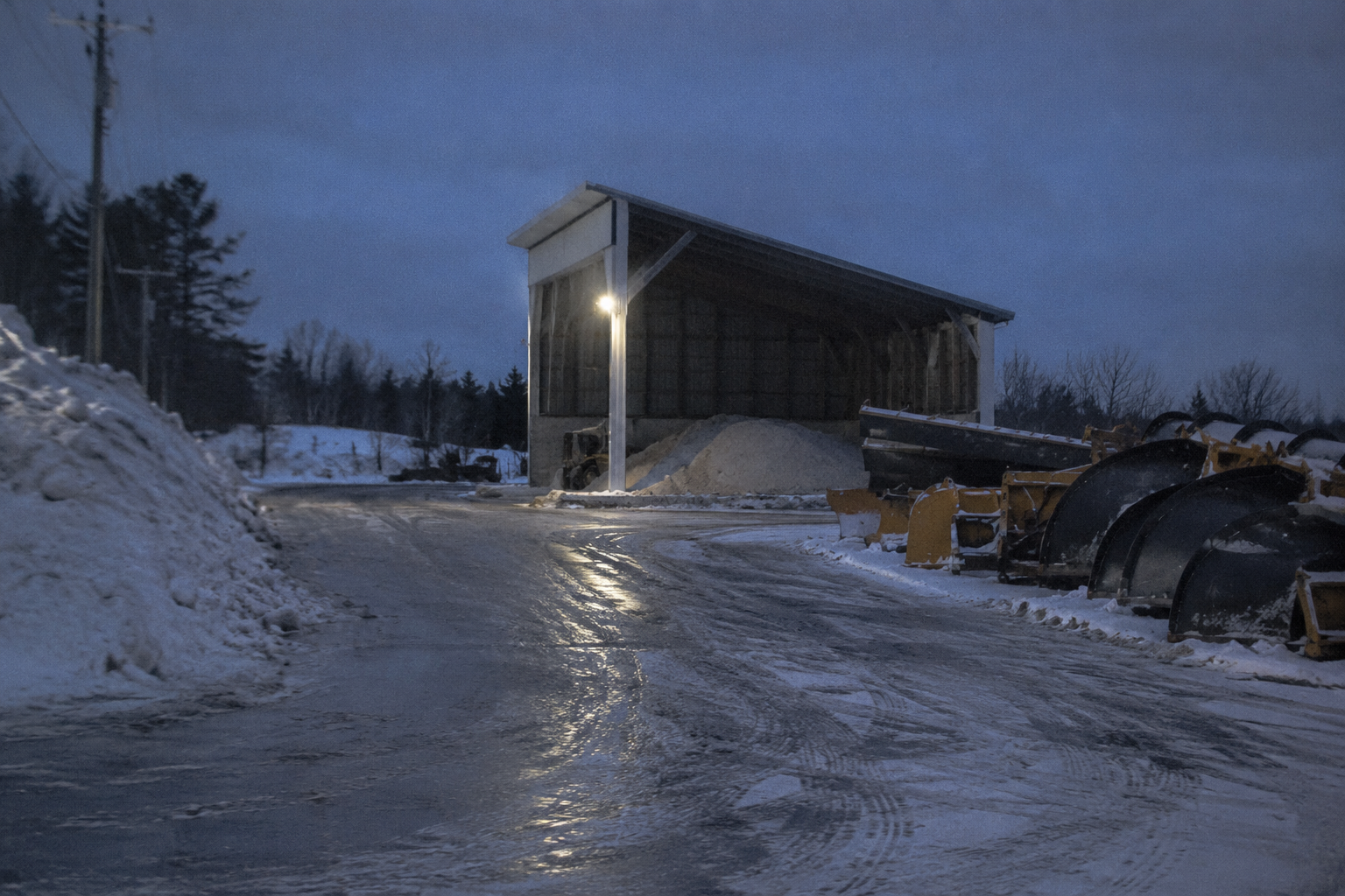 County salt shed yard after a snowstorm