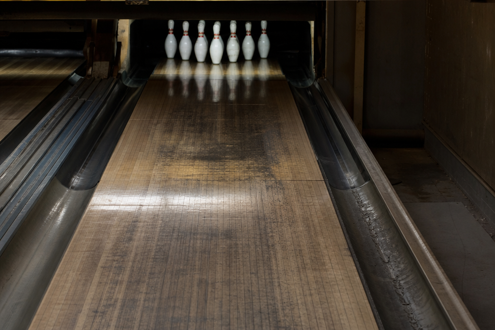 Faint oil smears near a bowling pin deck