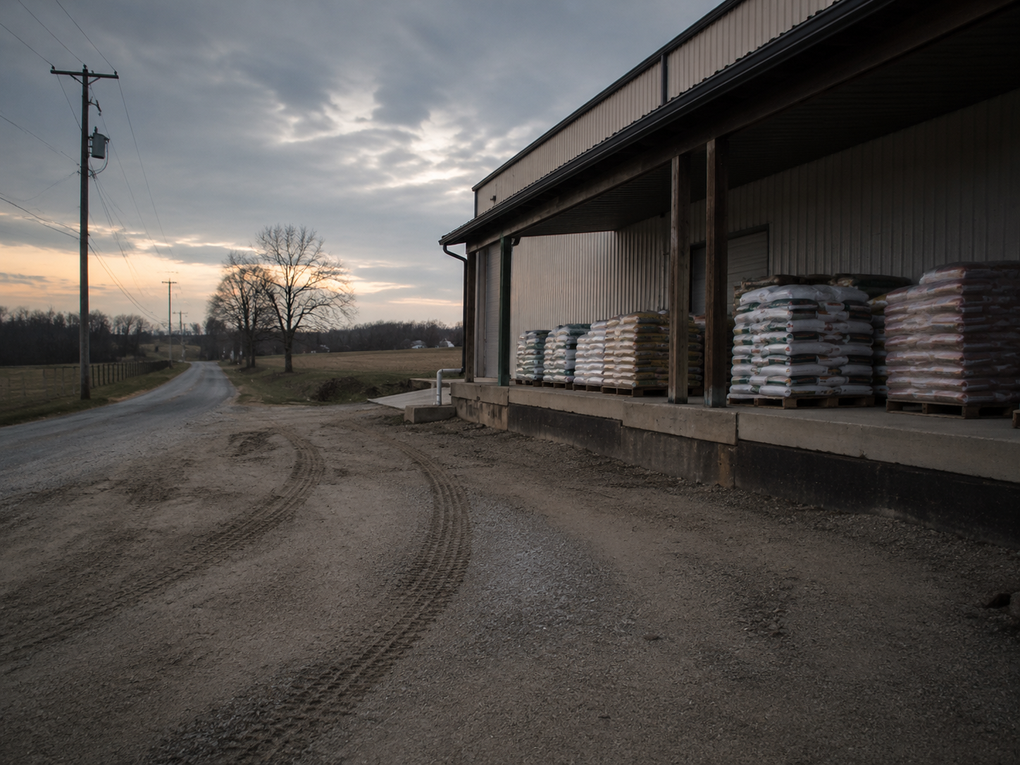 Farm supply loading dock in morning after report