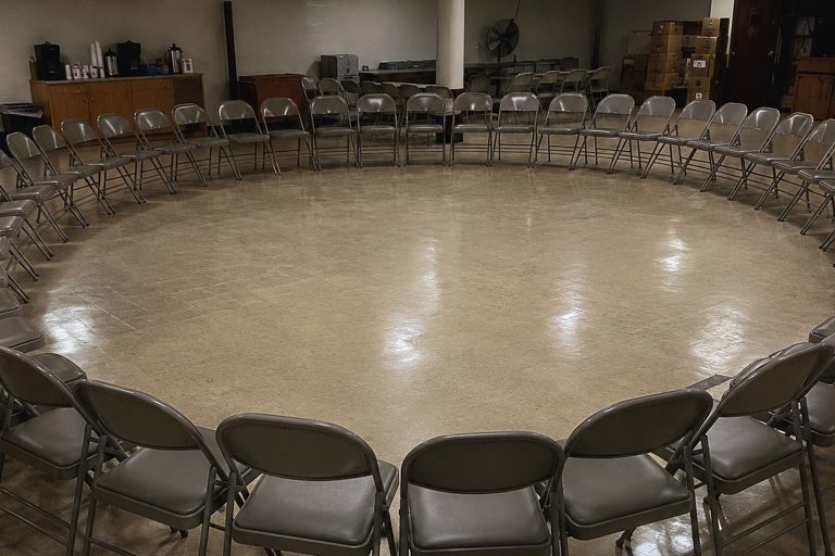 The Church Basement Folding Chairs Found In A Circle After The Lock-In reconstructed scene image 1