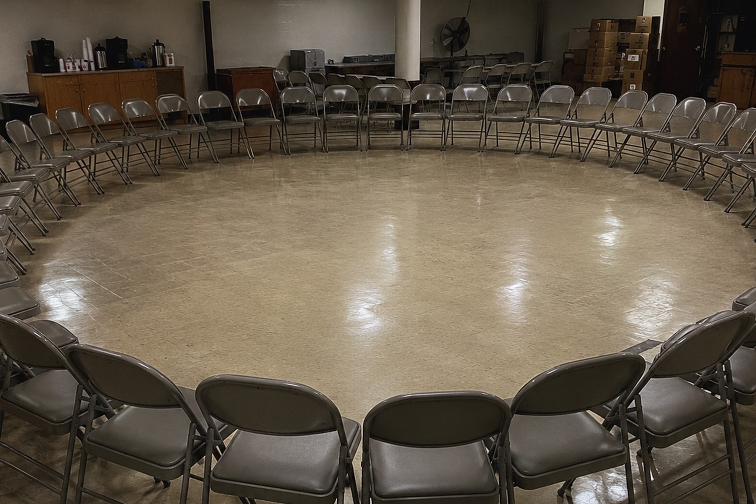 The Church Basement Folding Chairs Found In A Circle After The Lock-In reconstructed scene image 1
