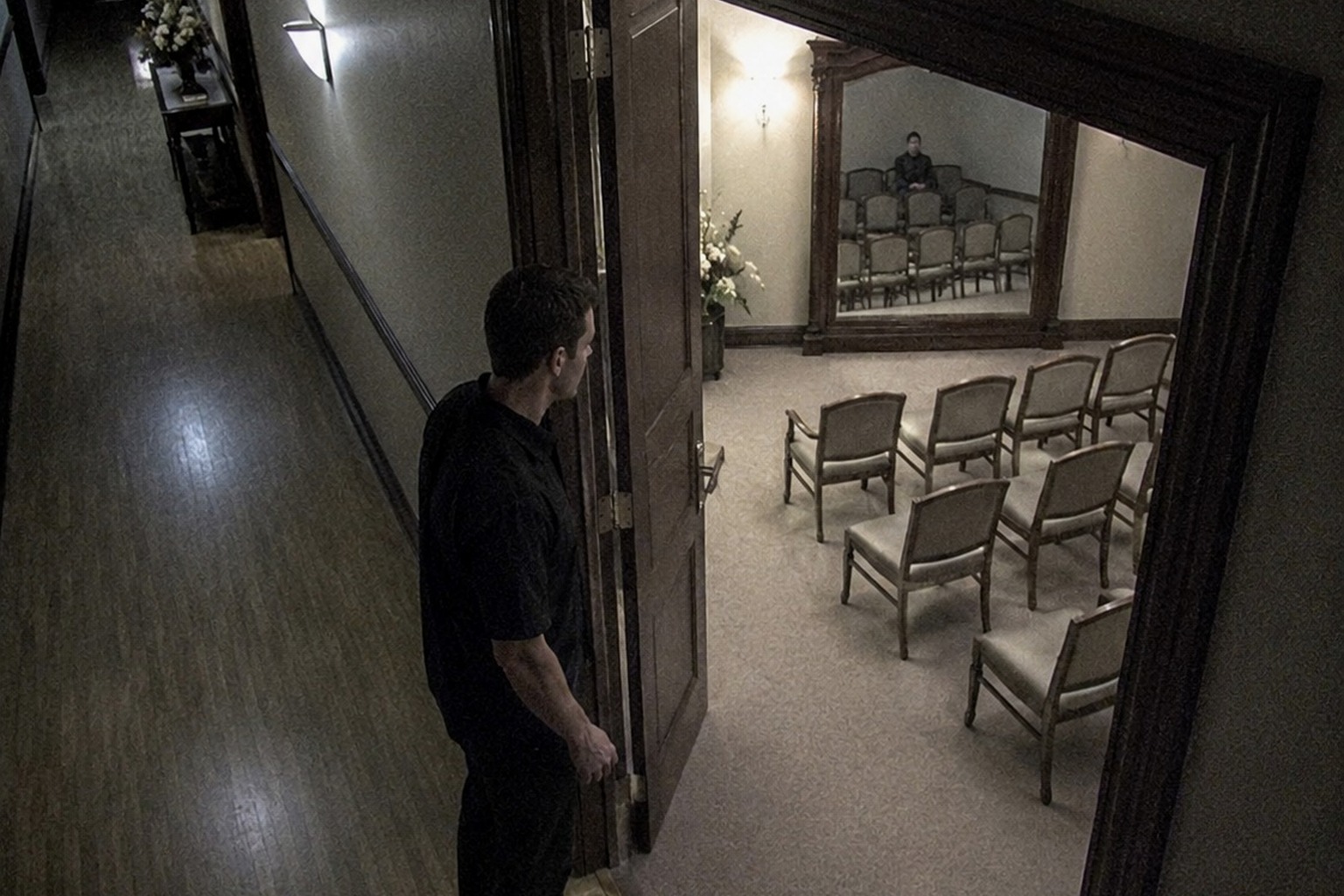 The Closed Funeral Home Viewing Room Mirror That Reflected Someone Sitting Up reconstructed scene image 4