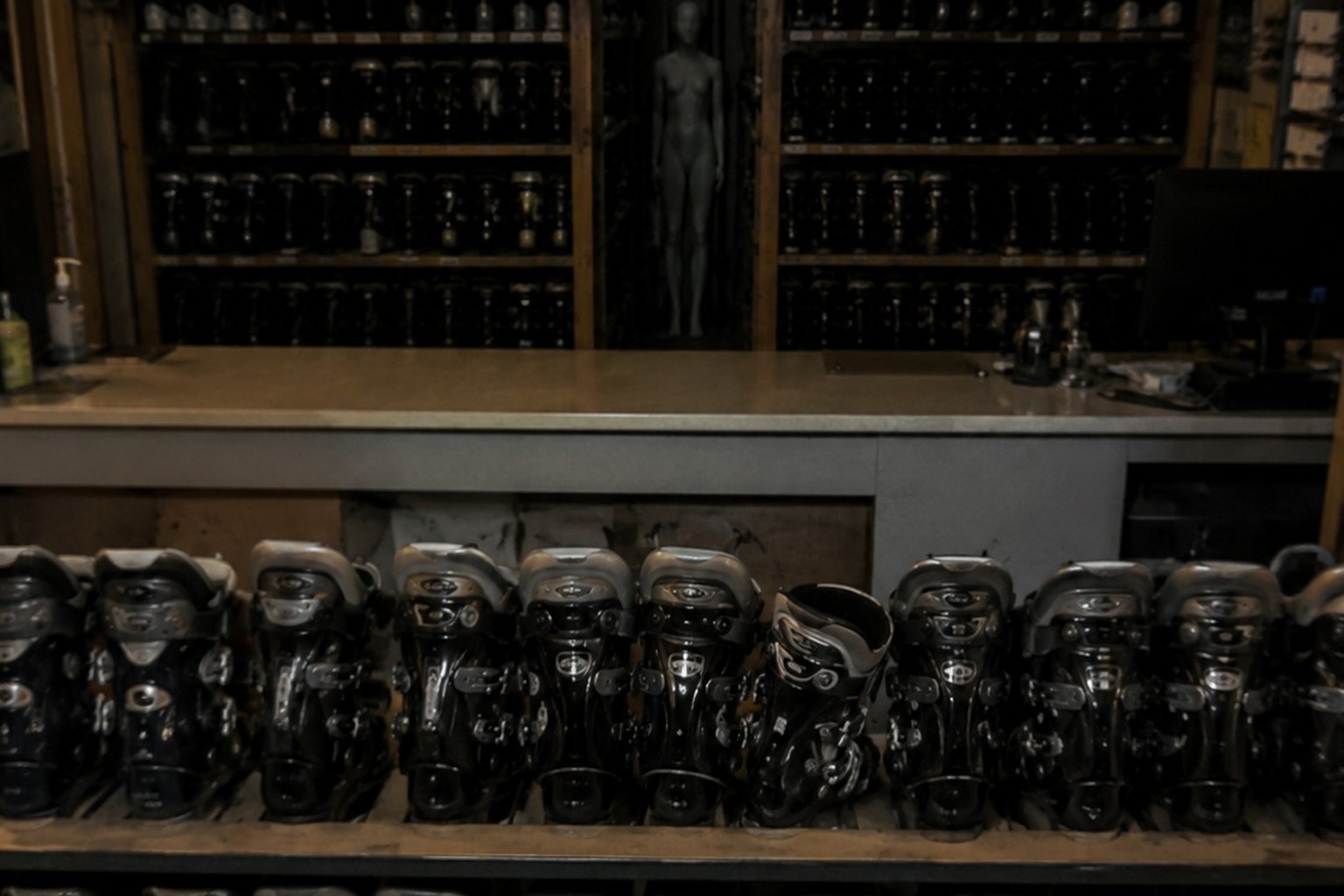 The Closed Ski Rental Counter Camera Showed A White Figure Behind The Boot Wall reconstructed scene 3