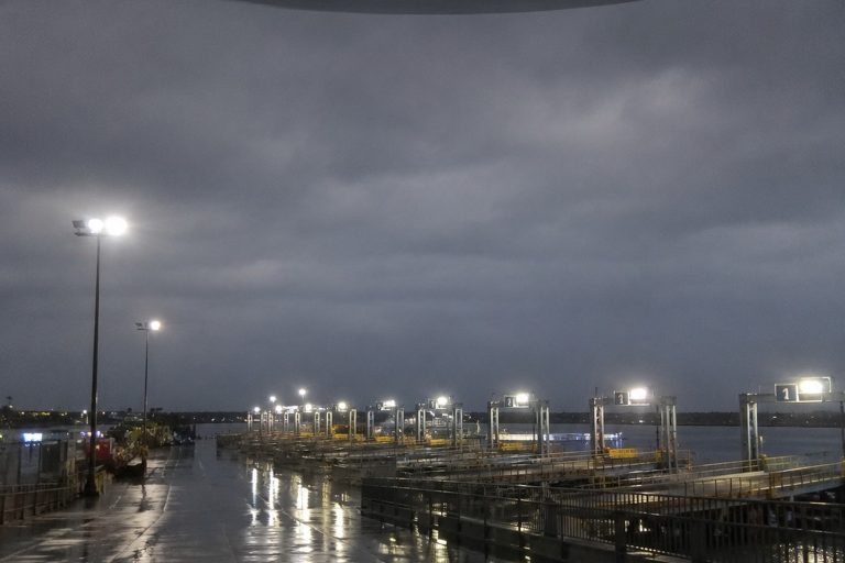 The Empty Ferry Terminal Photo Caught A Dark Oval Craft Above The Ramp Lights reconstructed scene 1