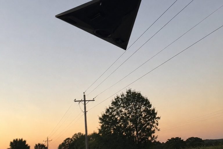 The Farm Road UFO Photo That Showed A Black Triangle Above The Power Lines