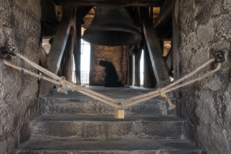 Editorial recreation of the Closed Bell Tower Camera Showed A Shadow Kneeling Behind The Locked Ropes story, image 1.