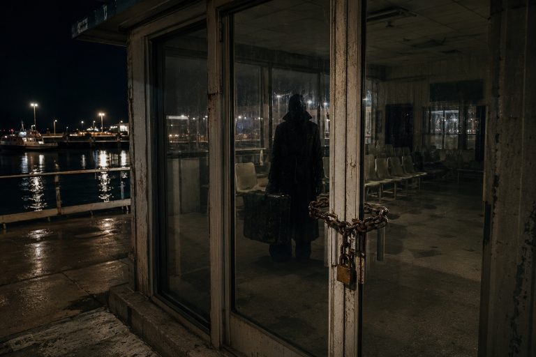 The Closed Ferry Terminal Camera Showed A Passenger Shadow Waiting Behind The Glass