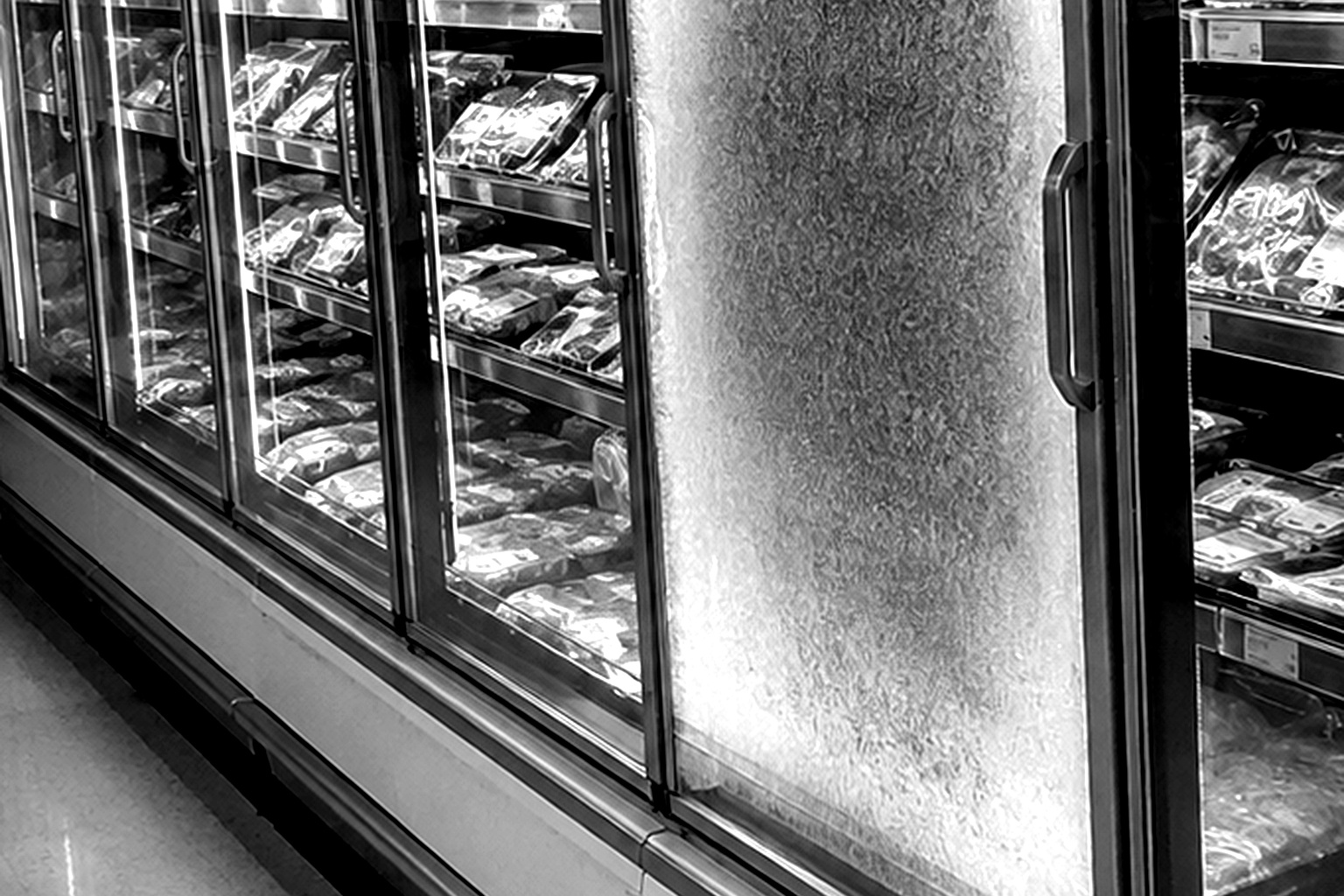 Editorial recreation of the Closed Grocery Store Freezer Aisle Camera Showed A Pale Woman Standing Behind The Frosted Meat Case story, image 3.