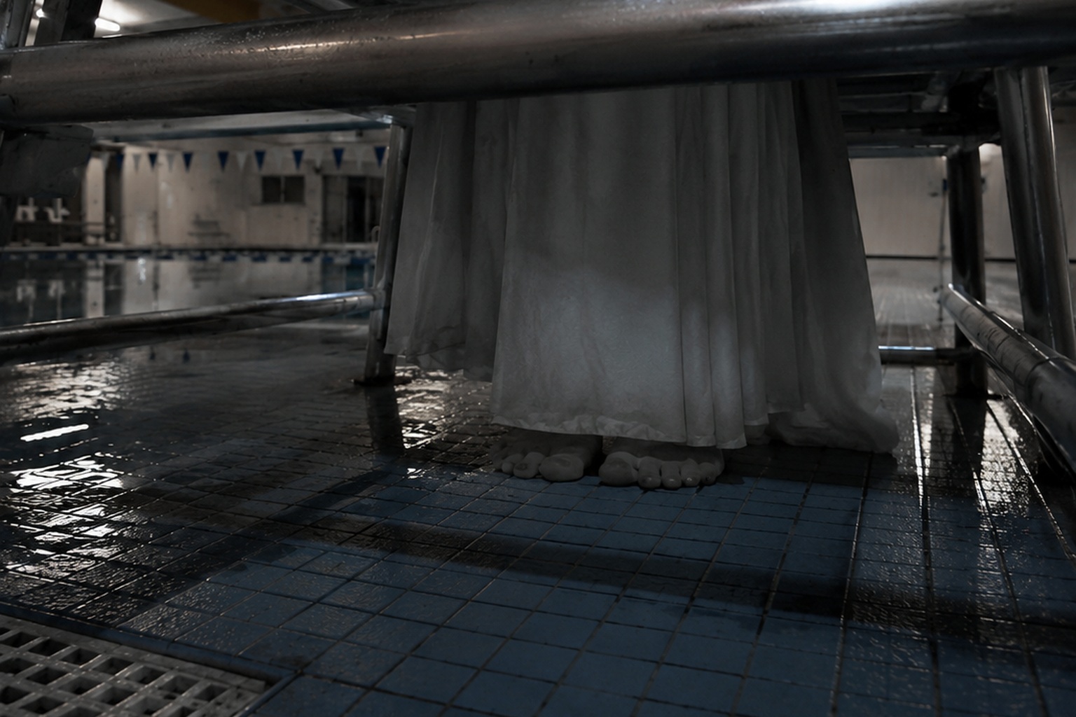 The Closed Indoor Pool Camera Showed A White Dress Under The Lifeguard Chair - article image 3