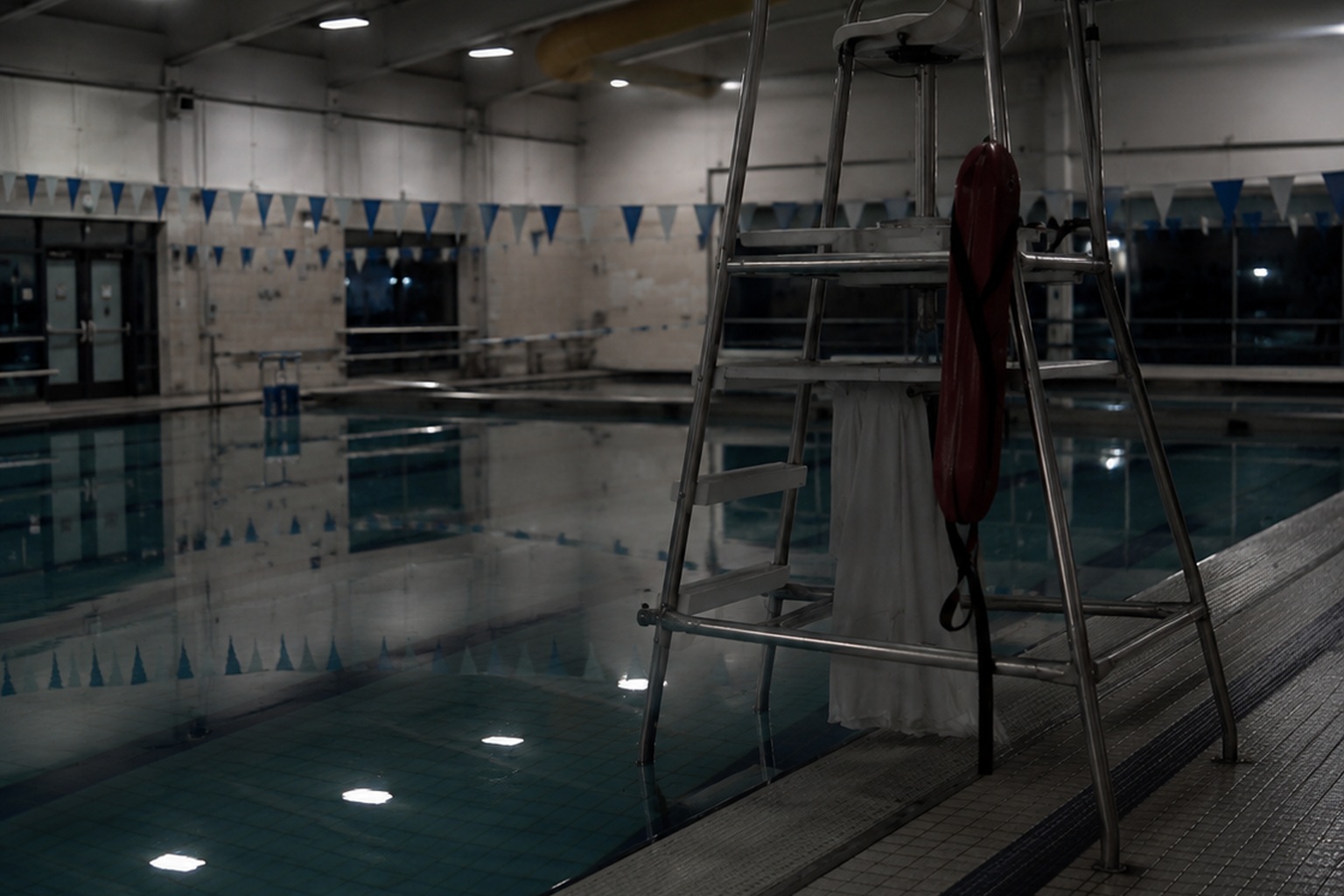 The Closed Indoor Pool Camera Showed A White Dress Under The Lifeguard Chair - article image 4