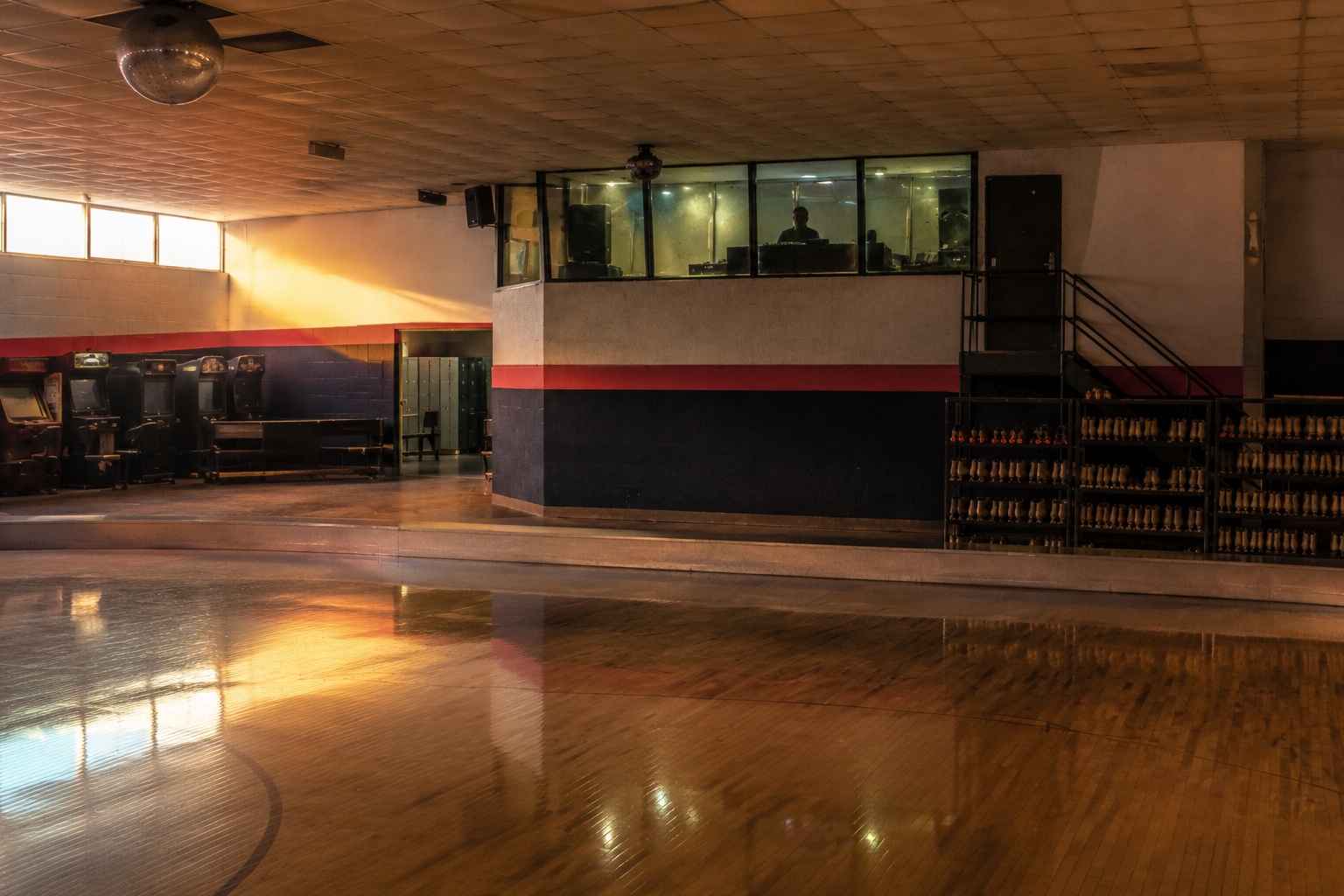 Editorial recreation of the Closed Roller Rink Ceiling Camera Showed A Pale Figure Sitting In The DJ Booth After Lockup story, image 4.