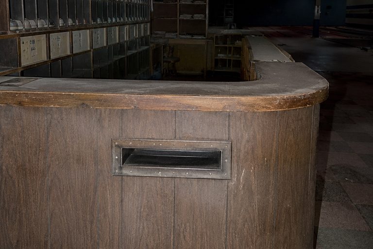The Empty Bowling Alley Shoe Counter Photo Showed Fingers Inside The Locked Return Slot - article image 1