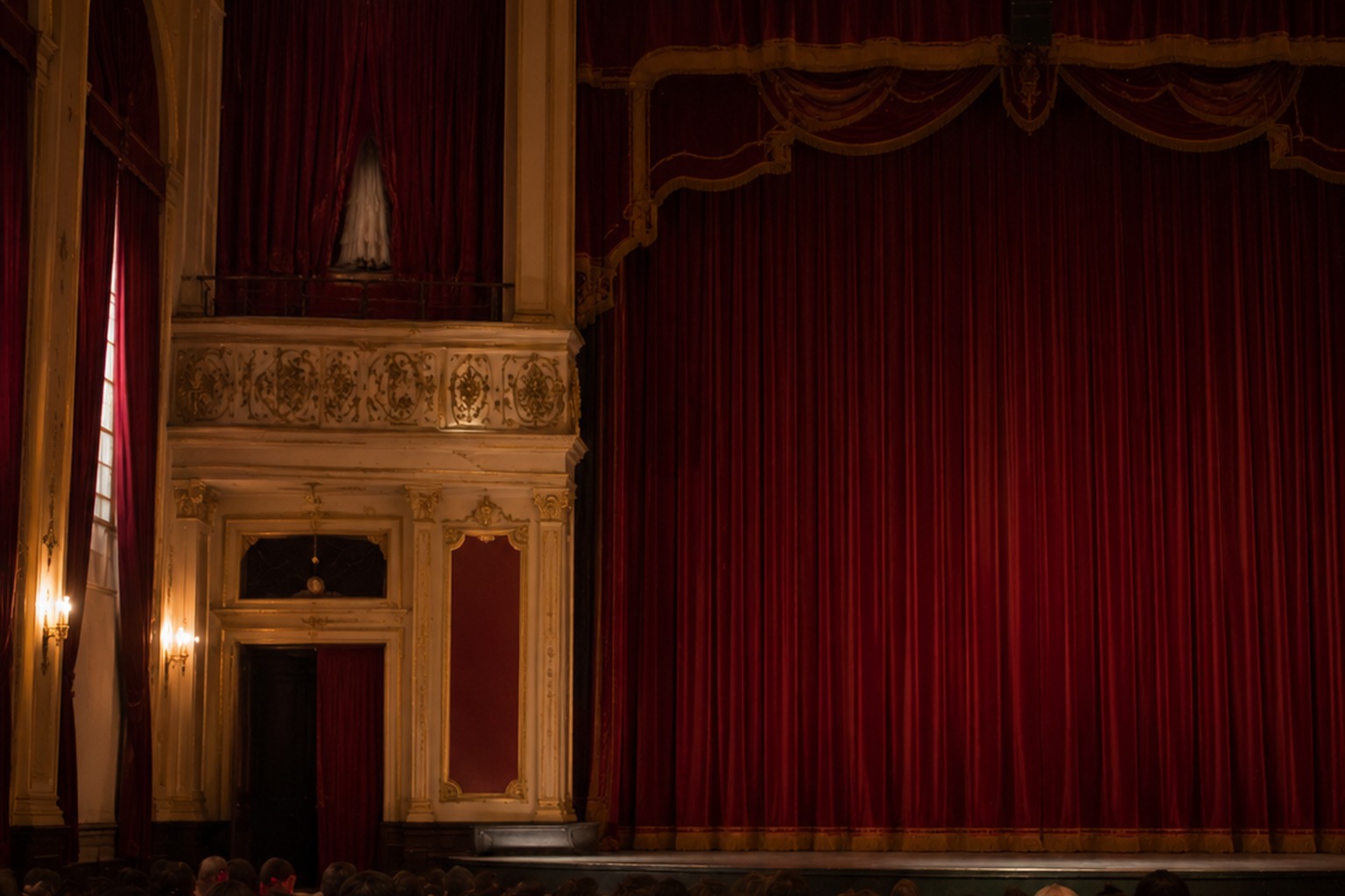 Editorial recreation of the Empty Community Theater Balcony Photo Showed A White Dress Behind The Torn Curtain story, image 4.