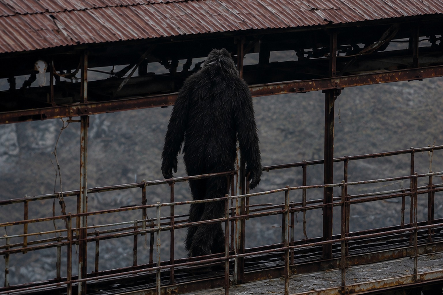 Editorial recreation of the Old Quarry Conveyor Photo Showed A Broad Hairy Figure Crossing The Rusted Catwalk story, image 4.