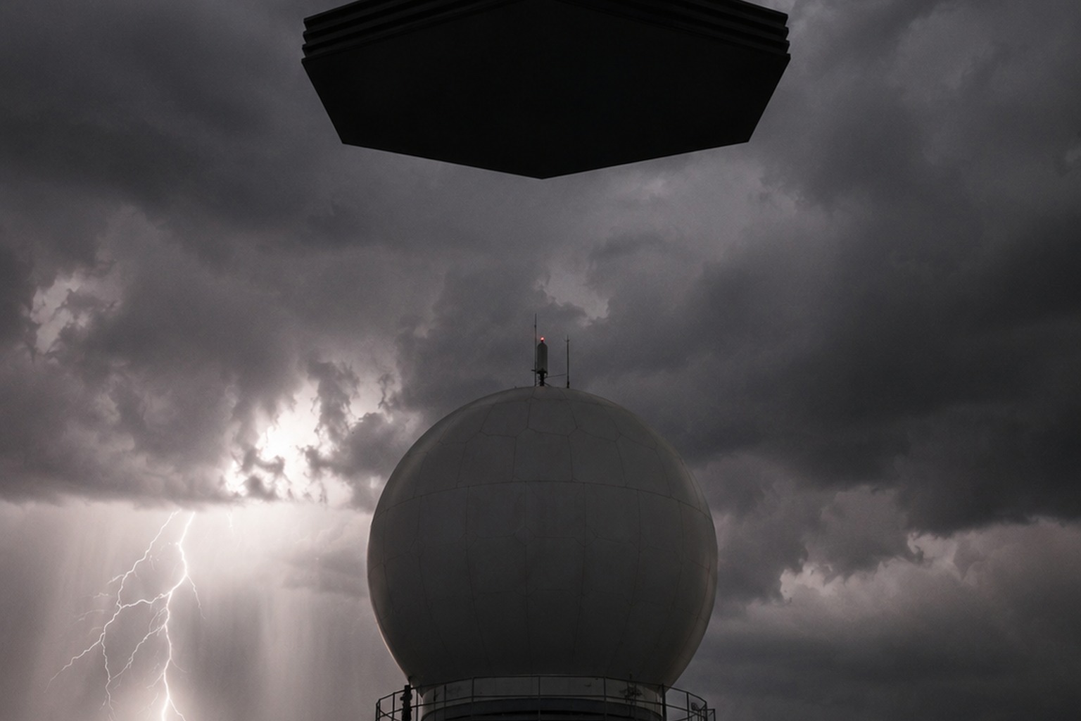 Editorial recreation of the Rural Weather Radar Camera Caught A Dark Hexagon Hanging Above The Storm Tower story, image 3.