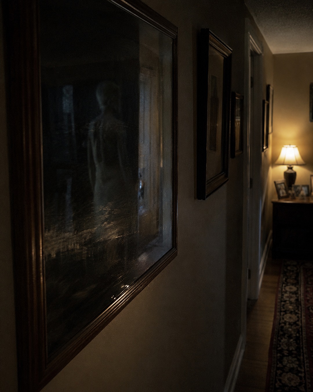 Editorial illustration of a glass reflection in a hallway that could create a human-like camera shape.
