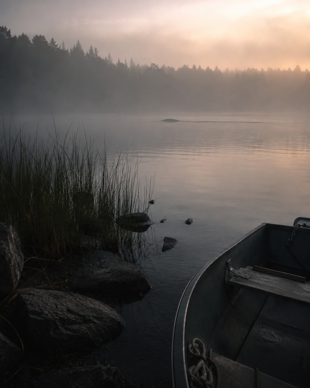 Editorial illustration of a distant wake line on a misty lake with shore scale cues.