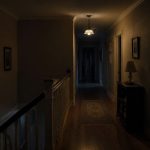 Why Do Hallway Lights Dim Before Apparitions?